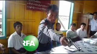 Gunwaving police officer goes viral in Myanmar [upl. by Bixler]