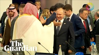 Putin and Saudi crown prince highfive at G20 summit [upl. by Scherle262]